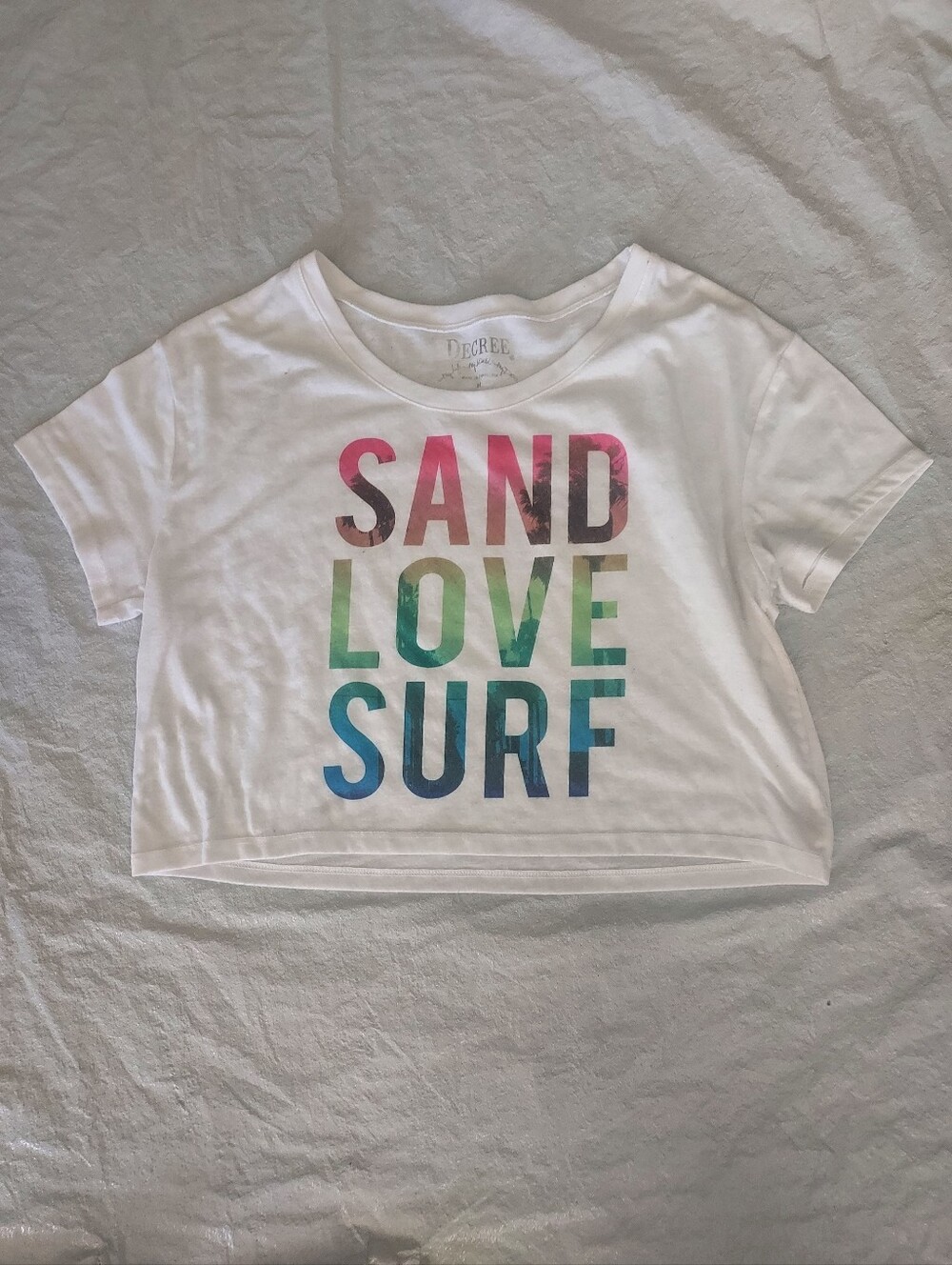 Decree White Crop Tee with Pink, Green & Blue 'SAND LOVE SURF' Graphic